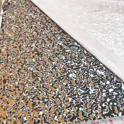 Guter Preis KTV-Decke 304 Große Silberne Wasserwellen Geprägte Spiegel 8k Dekorations-Edelstahlplatte Online